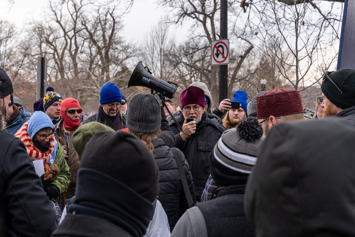 Fr Chad speaks through the megaphone