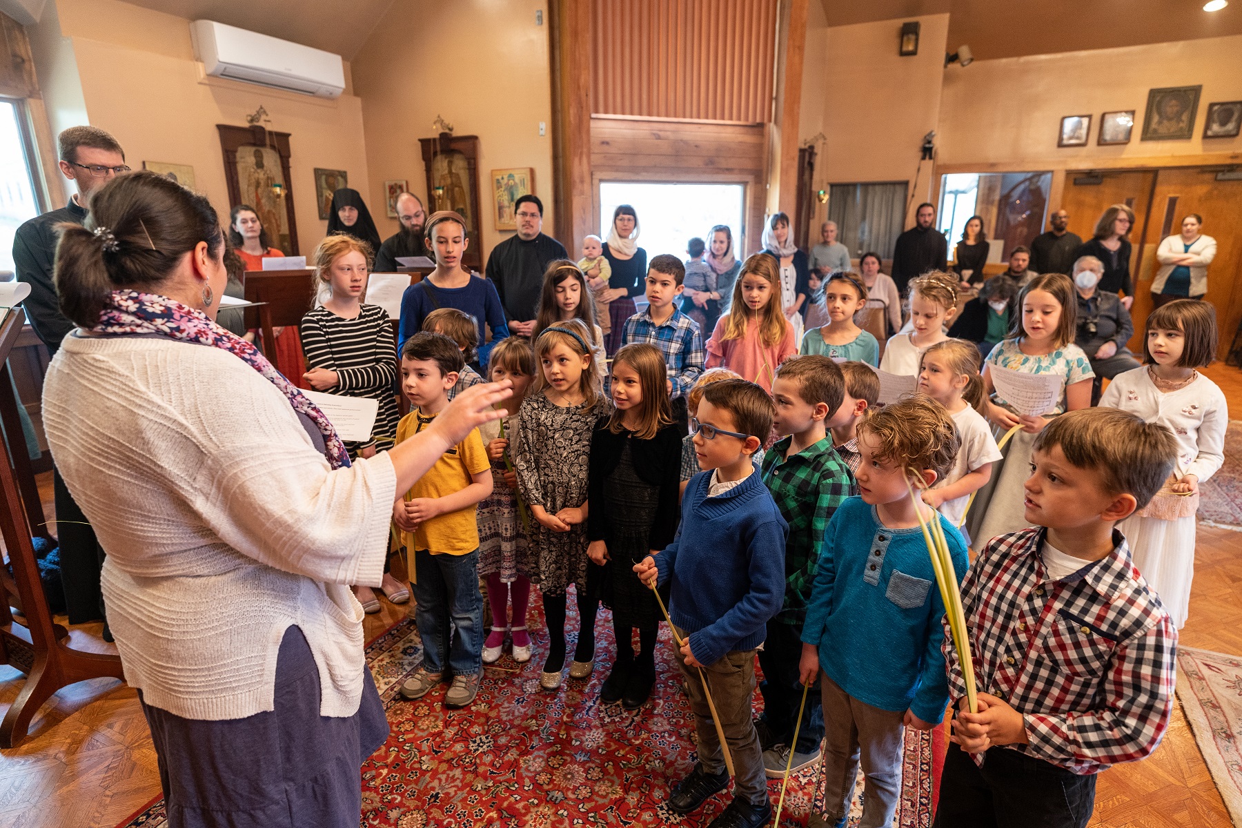 Children's choir sings Palm Sunday hymn