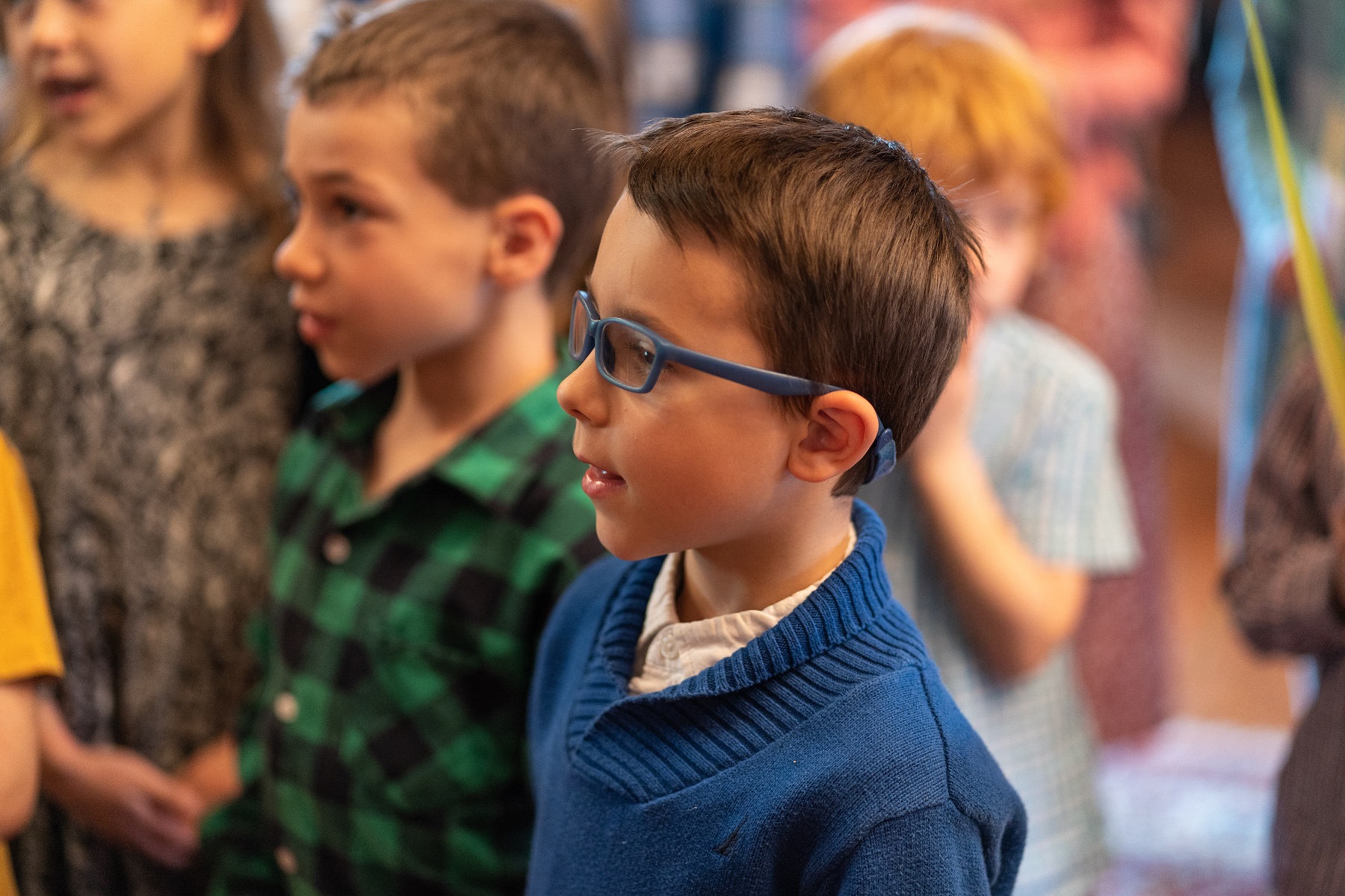 Children's choir sings Palm Sunday hymn