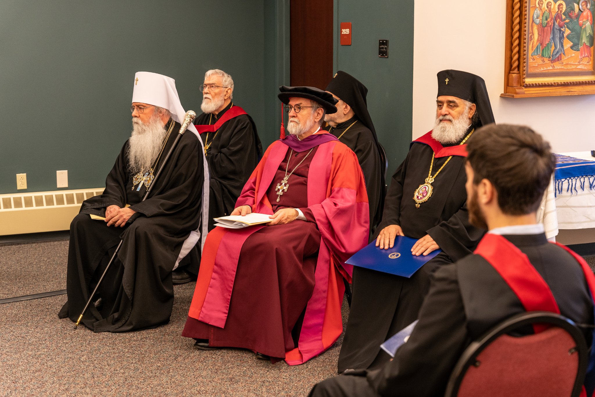 Fr Chad seated with Hierarchs