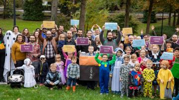 Seminary families hold up "Thank You" signs