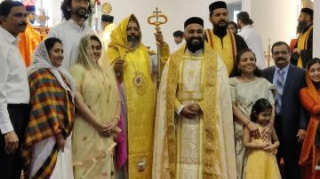 Fr Zachariah with his family and Metropolitan Aprem following ordination