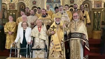 Fr Paul and Matushka Mary with Archbishop Michael, Fr Chad Hatfield, and other clergy, deacons, and altar servers