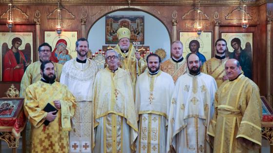 Clergy with the newly ordained and elevated deacon and archpriest