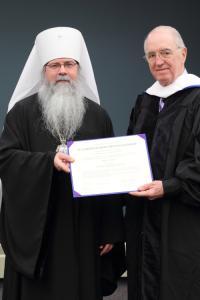 Met. Tikhon presenting Brian Gerich's honorary doctorate