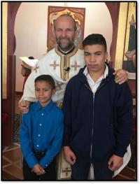 Fr Nick with boys at the orphanage