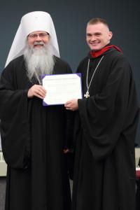 Fr James at graduation with Met. Tihon
