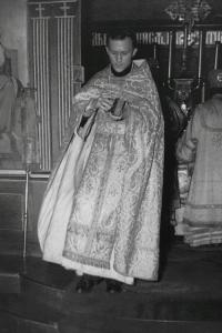 A young Fr Paul serving at Divine Liturgy