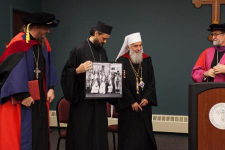The historic “Fond du Lac Circus” photo was presented to Patriarch Irinej on his visit to St. Vladimir’s in 2015.