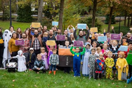 Seminary families hold up "Thank You" signs