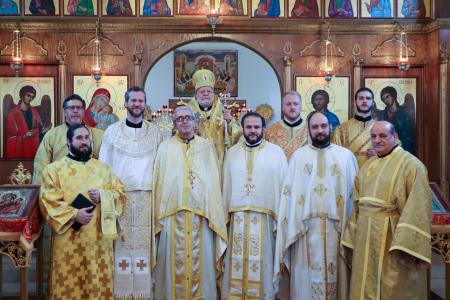 Clergy with the newly ordained and elevated deacon and archpriest