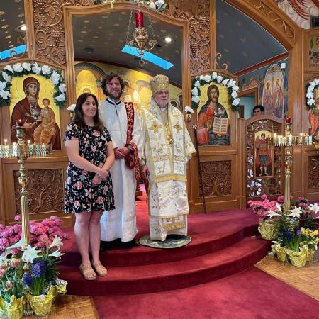 Dn Aaron, Tatiana, and Archbishop Mark following ordination